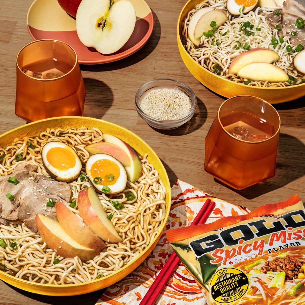 A bowl of gold spicy miso ramen on a dining table.