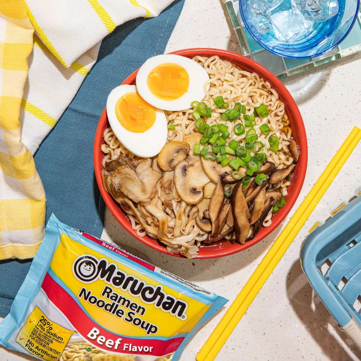 Bowl of ramen on a table with chopsticks