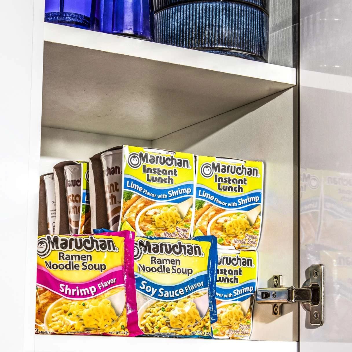Maruchan packages on a shelf in a cupboard